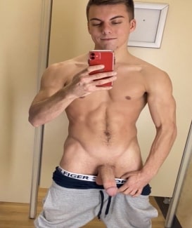 Muscular boy with a cut penis