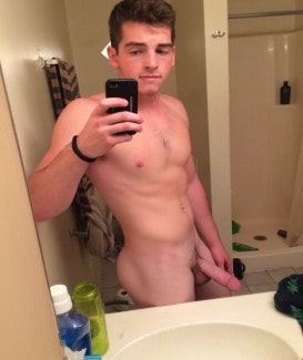Cute boy taking a nude selfie