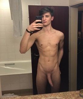 Nude boy taking a self picture