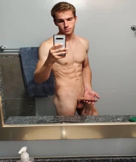 Nude guy holding his cock